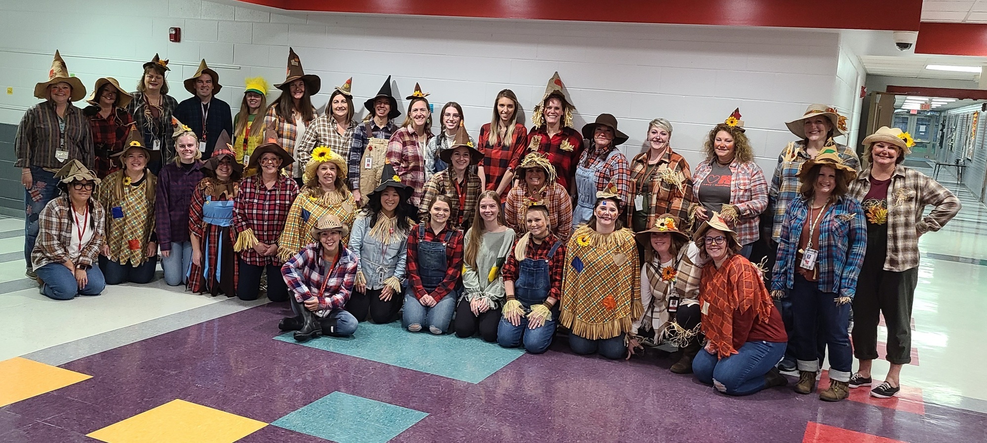 Davisburg staff dressed as scarecrows