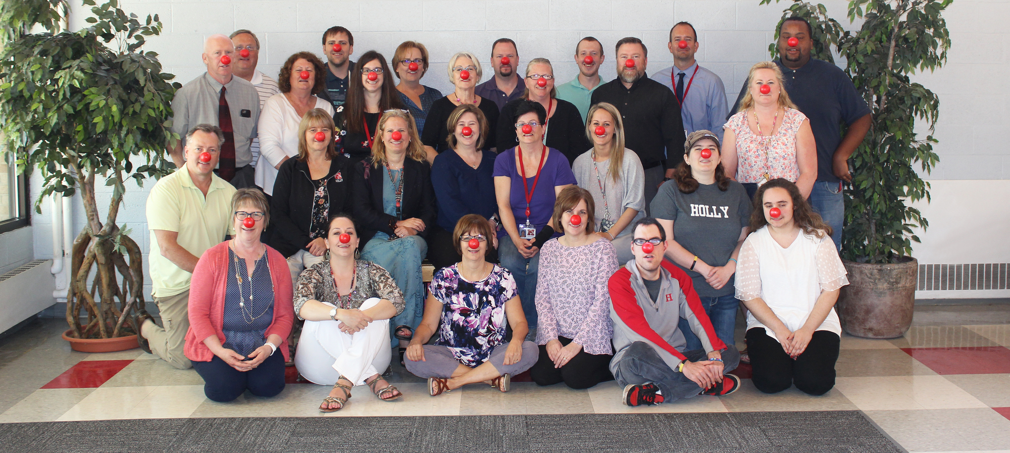 Picture of the Karl Richter staff wearing their red noses