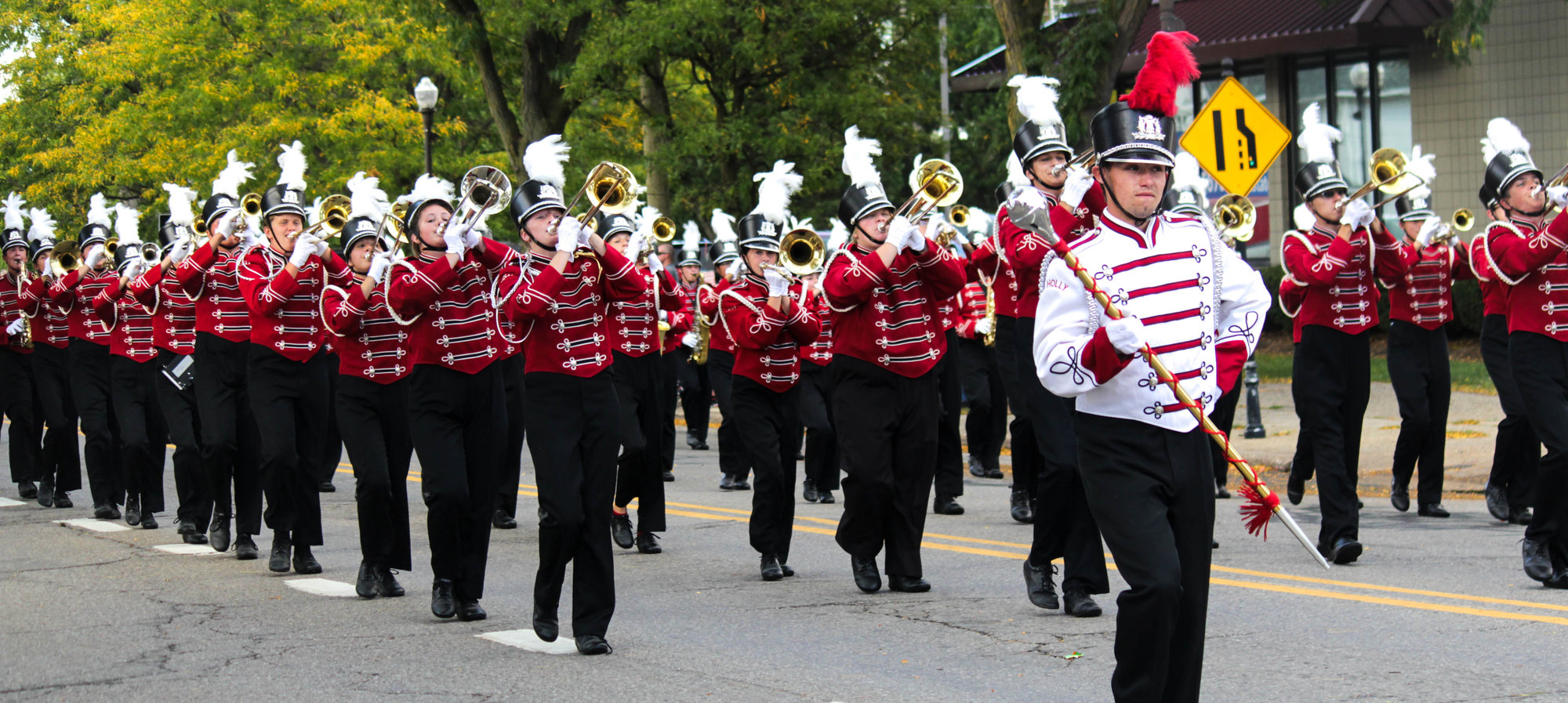 Holly marching band during the homecoming parade