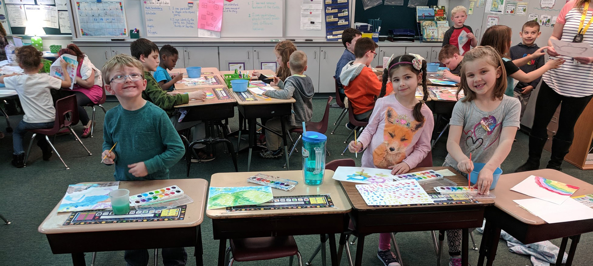 Students using watercolor in their classroom
