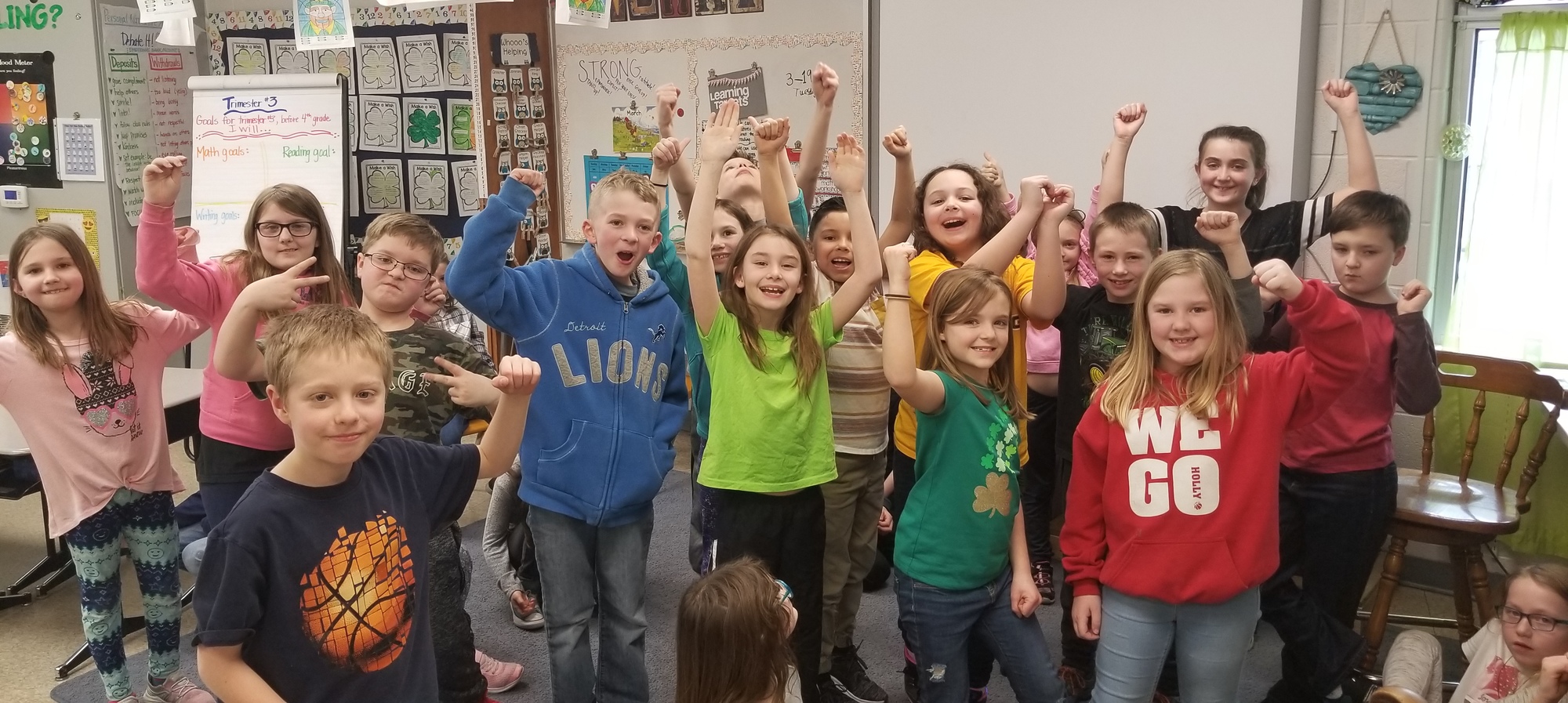 Third grade students at Davisburg standing and showing their I'm Strong faces.