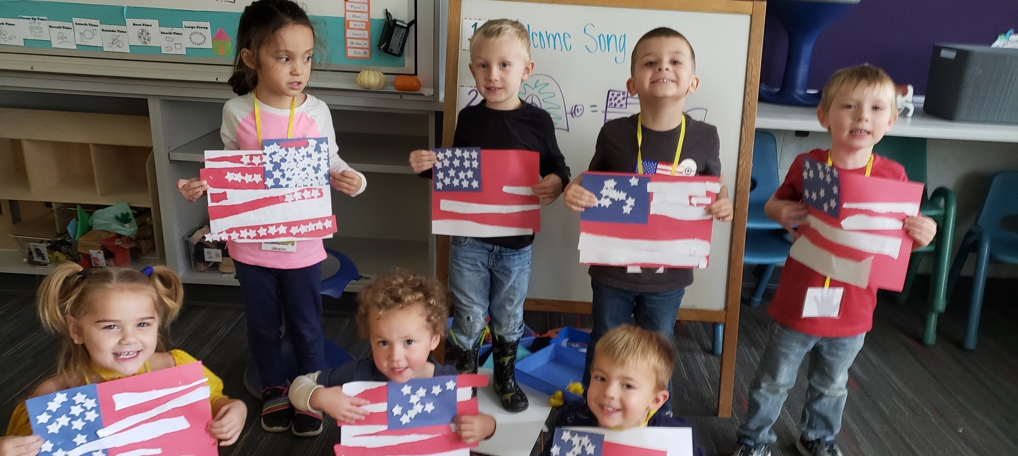Students with the flags they made