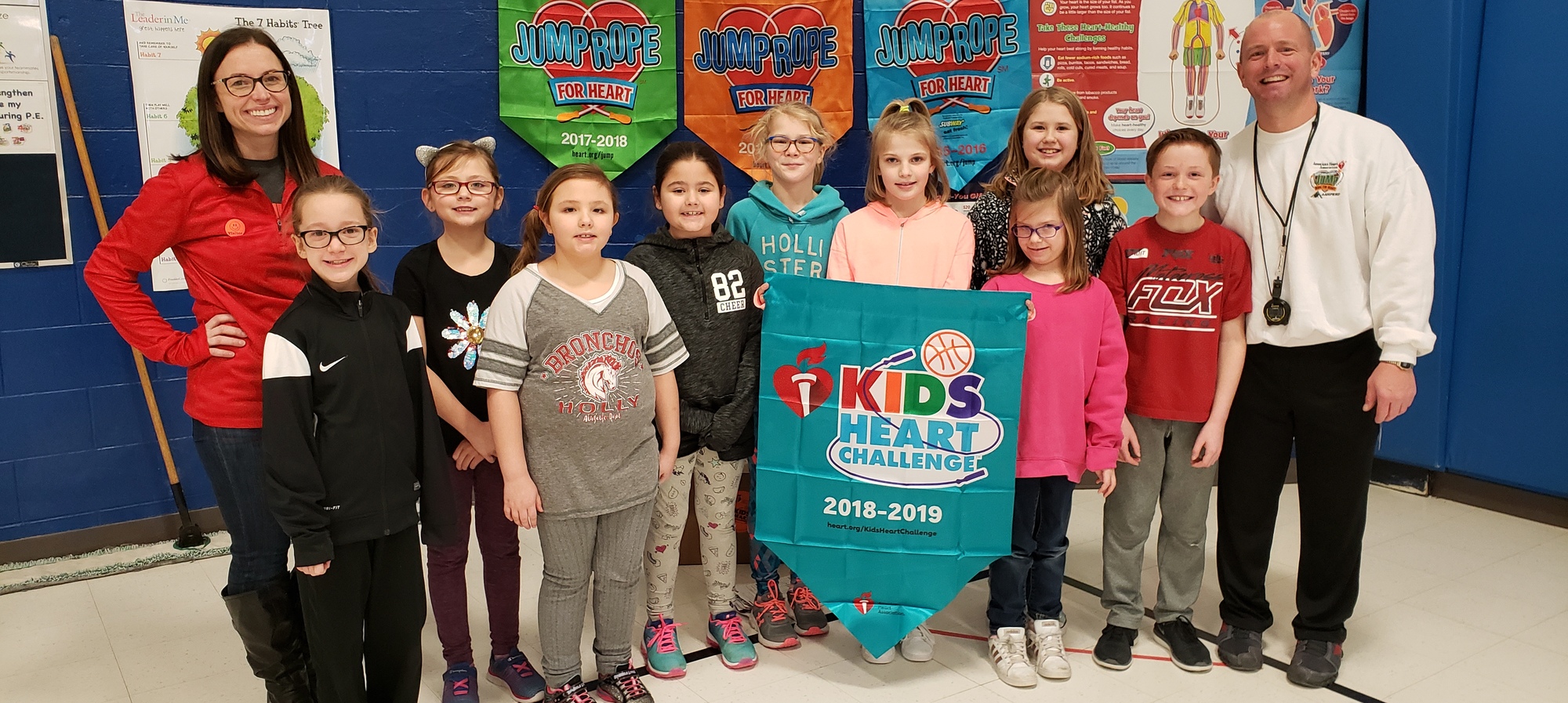 Students with Jump Rope for Heart banner