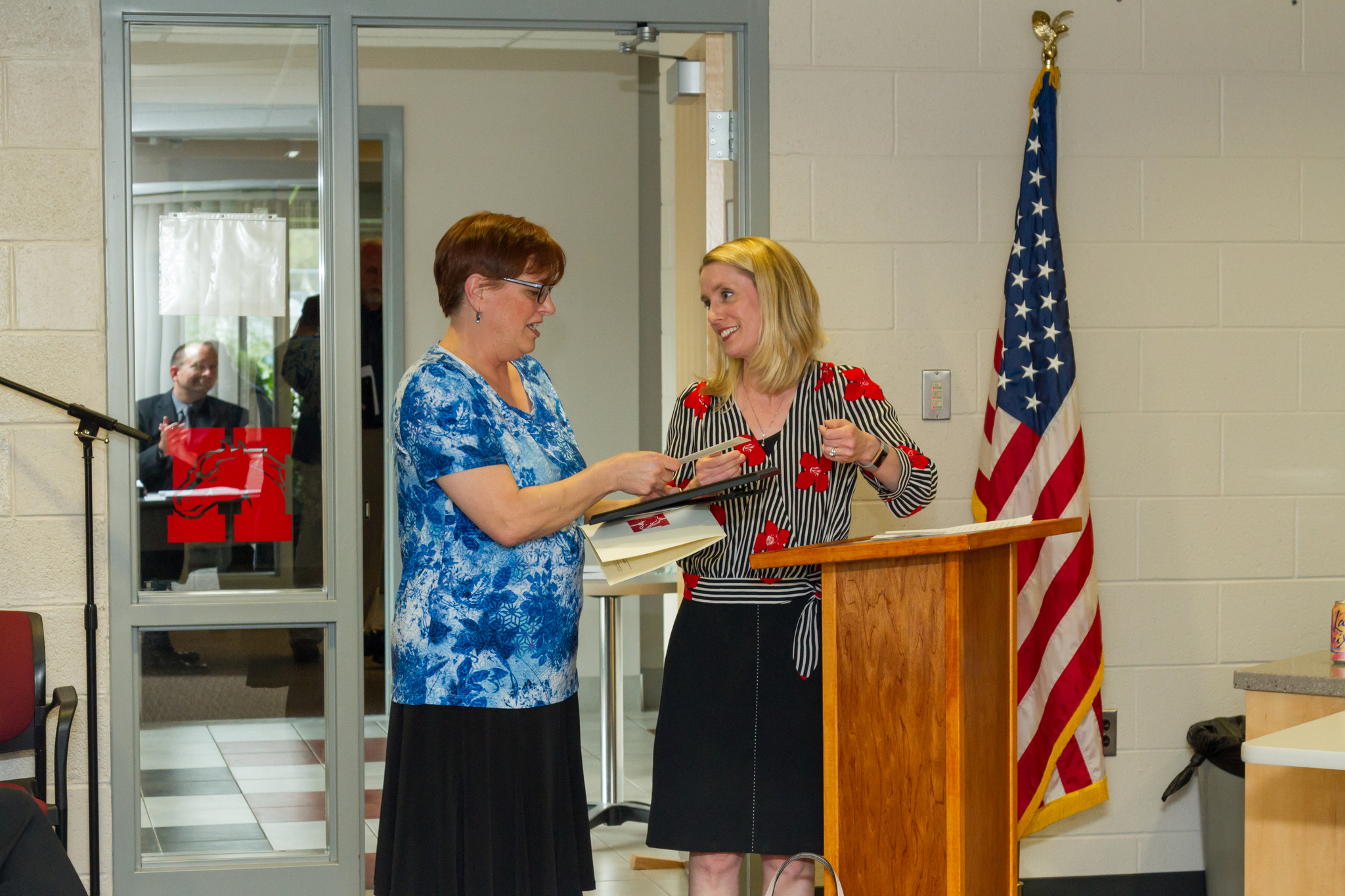Mrs. Oldaugh receiving her award from Oakland Schools