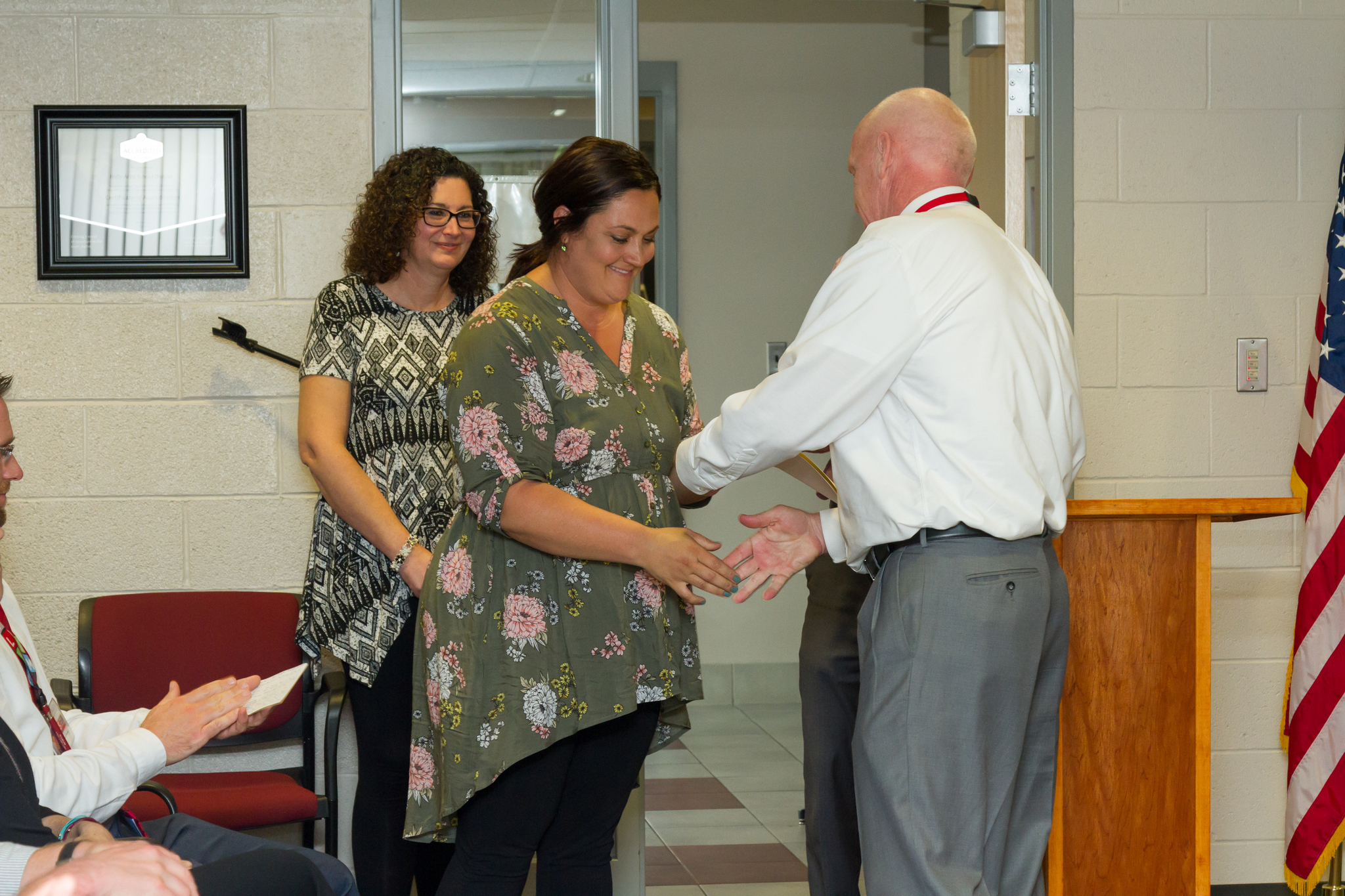 Mrs. Miller receiving her award from Mr. Nuss