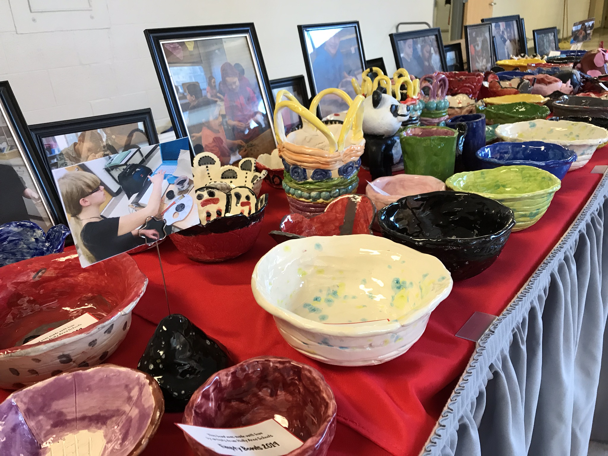 Pre-made bowls with pictures of student artists