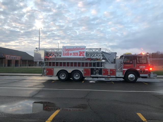 Fire truck with sign - congratulations Class of 2020