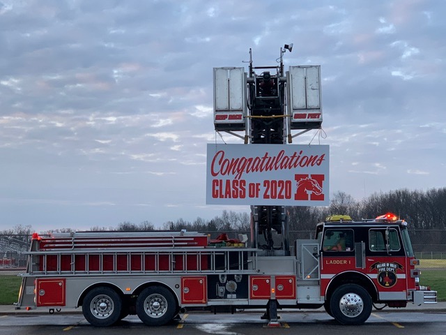 Fire truck with sign - congratulations Class of 2020