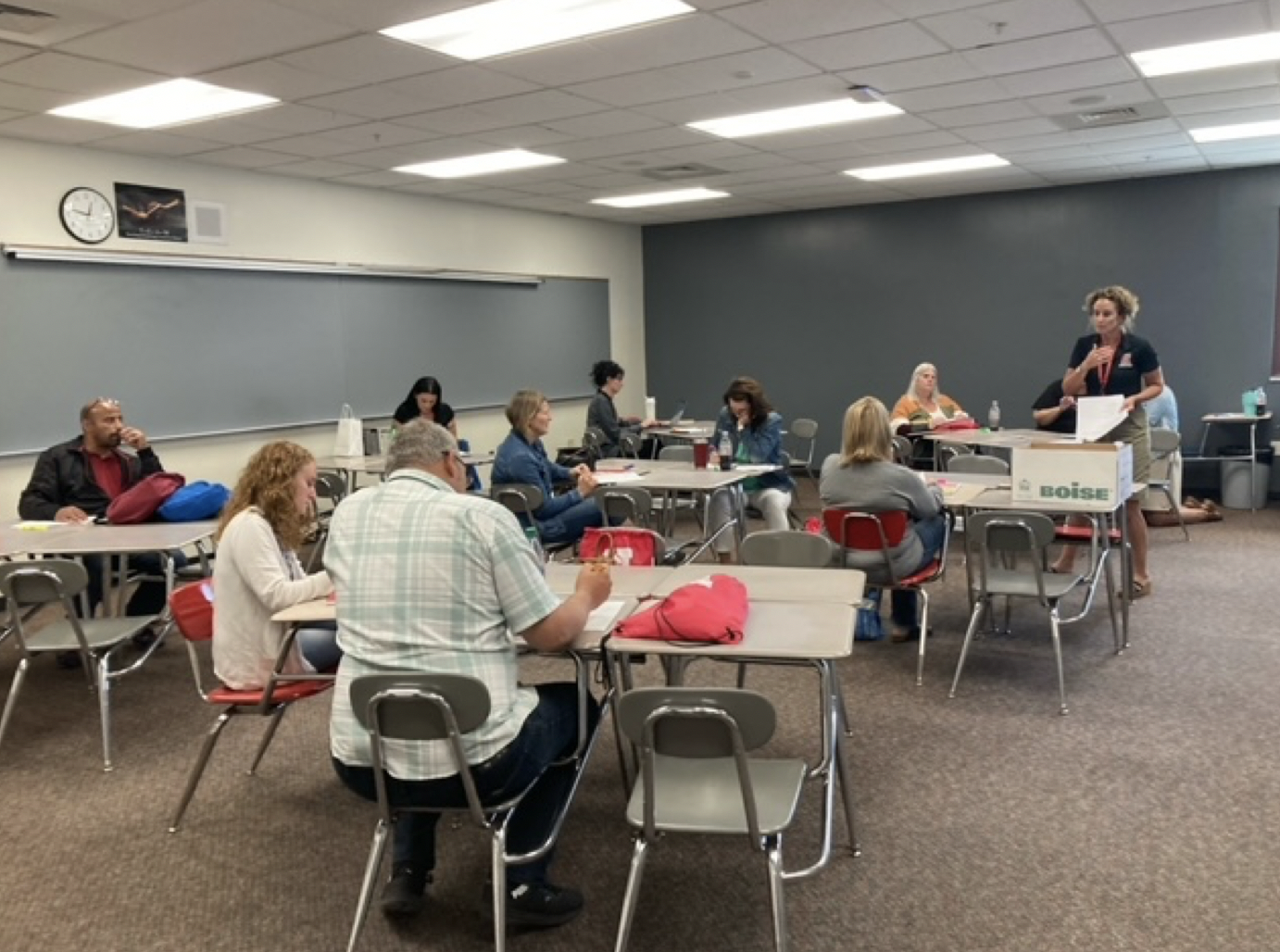 A Broncho Parent Camp leader interacts with parents