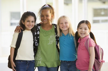Group of 4 girls with backpacks